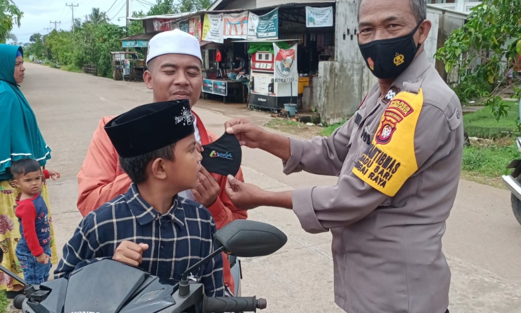 Bhabin Desa Madu Sari Lakukan Sosialisai Protokol Kesehatan